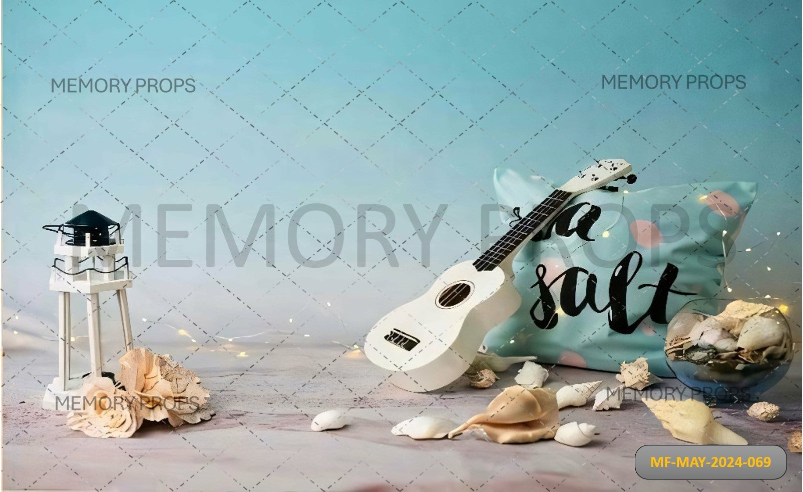 GUITAR SITS ON A BEACH WITH THE OCEAN PRINTED BACKDROP